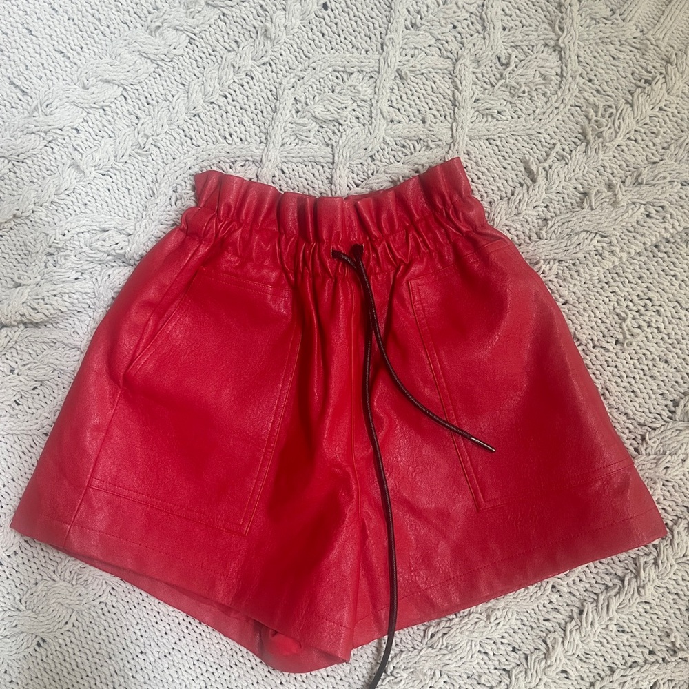 Faux red leather.